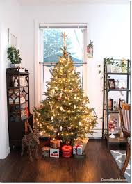 How To Make A Christmas Tree Look Fuller And Taller On A Budget Christmas Tree Diy Holiday Christmas Diy