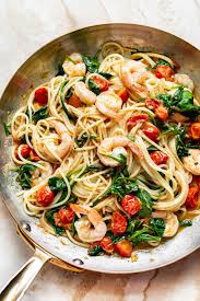 This Healthy Shrimp Pasta Is Loaded With Fresh Tomatoes Baby Spinach And Plenty Of Garlic It In 2020 Spinach Pasta Recipes Shrimp Spinach Pasta Shrimp Pasta Healthy