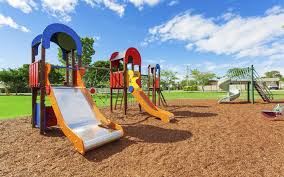 A playground, playpark, or play area is a place designed to provide an environment for children that facilitates play, typically outdoors. Rising Playground Temperatures