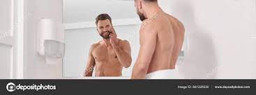 Seductive Mature Man Stylish Beard Bare Chest Applies Antiaging Cream Stock  Photo by ©dima_sidelnikov 661225530