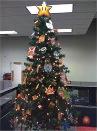 Find just the ornaments a great christmas tree needs, from festive and classy tree toppers to garlands, ribbons and tree skirts. Super Mario Tree Christmas Tree Themes Unique Christmas Trees Geeky Christmas Decorations