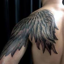 Black And Grey Realism Tattoo Artists Vancouver Wing Extending From Back Shoulder To Upper Arm Wings Tattoo Forearm Tattoos Feather Tattoos