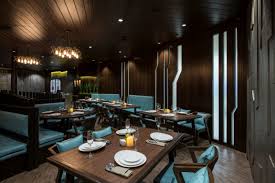 Your dining room floor plan is as much a document to help you design your space as it will be a map for your staff to navigate sections and table numbers. Vintage Looking Restaurant Design Has Modern Experience Neovana Design The Architects Diary