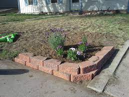 Everything I Want And Nothing I Don T Shut The Front Door Garden Retaining Wall Corner Flower Bed Front Yard