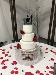 Elegant And Simple Three Tier Wedding Cake Gold Ribbon And Red Roses Wedding Cakes Tiered Wedding Cake Cake