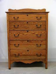 Tiger wood is a descriptive term that was introduced by interior decorators and furniture makers to he;p tiger oak is lumber produced by a particular milling process called quarter sawing. How To Tell If Wood Furniture Is Worth Refinishing Diy