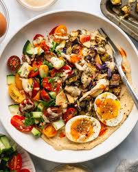 Crunchy Creamy Tangy Spicy This Twist On The Classic Sabich Hits All The Right Notes Recipe Roast Eggplant Hearty Dinner Recipes Hummus Bowl