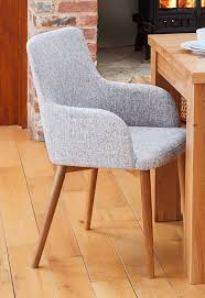 Dining chairs, dining room chairs and kitchen chairs. Baumhaus Mobel Oak Light Grey Fabric Dining Chair Pair Grey Upholstered Dining Chairs Fabric Dining Chairs Four Seater Dining Table