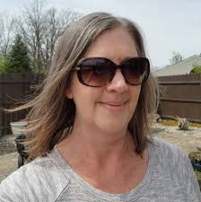 Who is a good hair stylist for men's long, thick, and wavy hair in West  Chester, Ohio?