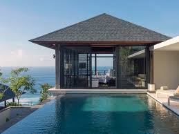 This particular beach villa offers an absolute and true experience that is complete with comfortable hammocks, bean bags, and numerous beach lounge chairs. Bali Luxury Villas Ultimate Bali Collection
