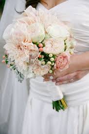 Most wedding bouquets go with traditional classics like roses or peonies so the hydrangea is often overlooked. Blush Chrysanthemum And Rose Bouquet