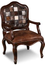 Okay So We Were Absolutely Amazed By The Gorgeous Intricate Evocative Artistry Of This Co Leather Living Room Furniture Cowhide Decor Antiquing Furniture Diy