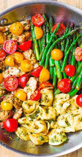 One Pan Pesto Chicken Tortellini And Veggies Asparagus Tomatoes Healthy Refreshing Mediterranean Style Di Summer Recipes Dinner Recipes Healthy Recipes