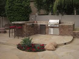 Seeing how we wanted to pour some concrete for a new patio/walk, why not build a new bbq from brick. Lightd Backyard Bbq Pit Backyard Arizona Backyard