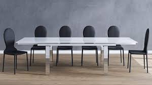 Add versatility to your dining room or kitchen with an expandable dining table. Zuri Furniture Modern Montez 106 Inch Expandable Dining Table With White Glass And Polished Stainless Steel Legs Buy Online In Antigua And Barbuda At Desertcart 27488827