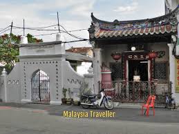 The once famous cathay cinema still stands on one side and the deserted old bus terminal on the other. Hang Kasturi Mausoleum Melaka Malaysia