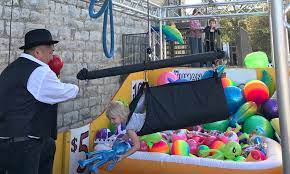 Claw machines aren't just for the arcade any more. Hire Giant Human Claw Machine Interactive Event Entertainment Texas Usa