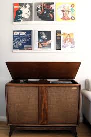 Draw a design on the record using a number 2 pencil before you start cutting it. Easy Record Shelves How To Make A Wall Shelf Home Diy On Cut Out Keep