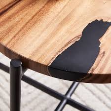 Everyone faces each other around a round table and you can make room for socializing by simply adding a leaf. Wood Resin Round Side Table