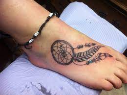 Unlike women, who often make a dream catcher tattoo design on foot on the lower back, the men take advantage of the top, particularly the blade area and the latissimus dorsi. Pin By Meagan Cameron On Tattoos Foot Tattoos Cool Tattoos Tattoos