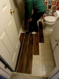 Peel And Stick Wood Laminate Perfect For Guest Bath Master Bathroom Makeover Bathroom Makeover Home Remodeling