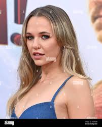 Westwood, CA. 14/03/2023, Madison Iseman arriving at the Los Angeles  premiere of Warner Bros.' “Shazam! Fury of The Gods” held at the Regency  Village Theatre