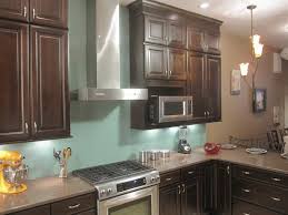 They come in a variety of colours, and they'll help protect your walls from messy cook. How To Install A Solid Glass Backsplash Glass Backsplash Kitchen Kitchen Backsplash Trends Glass Backsplash