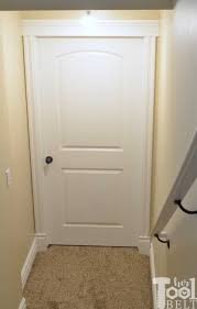 It is accessed through a wooden door without a key, in the ground of the house which leads to a staircase. Moving A Door In The Basement Her Tool Belt
