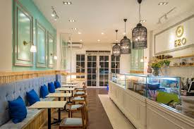 Ezo Cheesecakes Bakery Is Specialized In Hokkaido Cheesecakes From Japan A Modern Classical Interior With Bakery Interior Bakery Design Interior Architecture