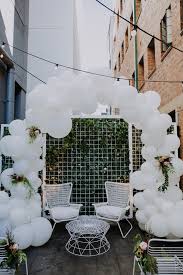 Cloth drapes in blue, white and red, deck chairs, put your face through photo boards, lamp posts, to the beach sign, large shells, stick of rock, festoon lights, naughty. Kara S Party Ideas Chic Modern Rooftop Wedding Kara S Party Ideas