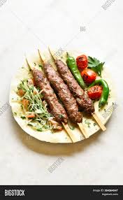 Bıçak kıymaların şişlere dizilmesine saplama adı verilir. Turkish Adana Kebab Image Photo Free Trial Bigstock