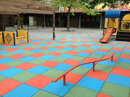 Pros & Cons: Rubber Tiles for Playground Surfacing - adventureTURF