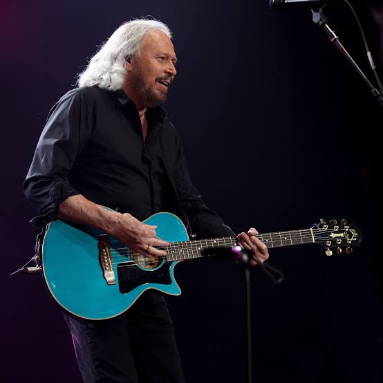 Barry Gibb celebrates brothers he survived