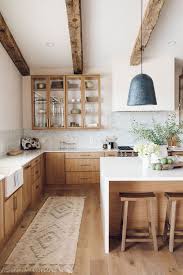 This soft neutral on the lower cabinets is called woodrow wilson putty by valspar ®. 67 Inviting Kitchen Designs With Exposed Wooden Beams Digsdigs