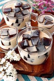 Cubes Of Jelly Flavored With Coffee Served In A Thick Sweetened Cream This Coffee Jelly Is Definitely A Cro Jelly Recipes Desserts Coffee Jelly Jelly Recipes