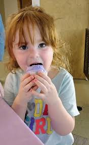 This little girl cannot get any cuter with her purple birthday cupcakes!  Happy Birthday Zelie! 🩷