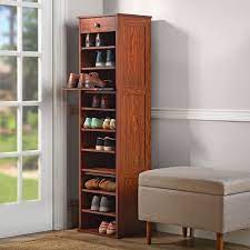 The Slide Out Shoe Storage Tower For 189 From Hammacher Schlemmer Shoe Storage Small Space Storage Towers Diy Shoe Storage