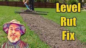 Leveling Bumpy Lawn Youtube Lawn Care Lawn Care Tips Backyard Garden Layout