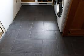 The Floors Weren T A Deal Breaker But Definitely Showing Wear We Ripped Them Out And Replaced With This 12 X 24 Porcelain Tile From Hom Kitchen Floor Tile Patterns Tile Floor Flooring