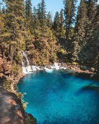 Freezing Topaz Blue Water Emerging From Rocks Campingandhiking Blue Water Water Best Camping Gear
