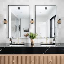 A backsplash is what you will usually see behind your bathroom vanity countertop to help reduce damage to walls behind the sinks. 23 Stylish Bathroom Backsplash Ideas