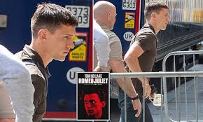 Tom Holland looks downcast as he's seen for the first time since cancelling  first performance of West End's Romeo & Juliet