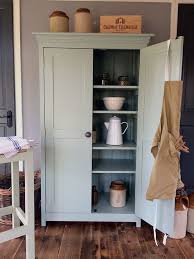 This One Piece Freestanding Larder Cupboard Manages To Squeeze Ample Storage Into A Smal Larder Cupboard Larder Cupboard Freestanding Kitchen Furniture Storage