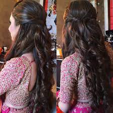 Another natural curly hairstyle to go for on the wedding day. Long Hair Love Hair Artistry By Archana Rautela Party Hairstyles For Long Hair Engagement Hairstyles Hair Styles