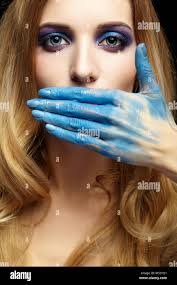 Blonde girl painting hi-res stock photography and images