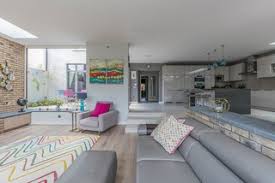 Modern kitchen peninsulas and bar tables allow to maximize small spaces and find the best combination of furniture pieces for each small kitchen design. Open Plan Kitchen Living Room Dublin Minimalistisch Wohnbereich Dublin Von Tilestyle Houzz
