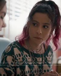 WornOnTV: Maya's green skull sweater