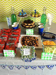 A taco bar is perfect for family gatherings, graduation parties, and birthday parties. Walking Taco Bar Birthday Party Aprons And Stilletos Walking Taco Bar Taco Bar Party Taco Bar