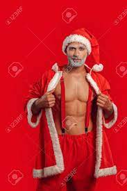 Nude Santa Claus Takes Off The Costume Stock Photo, Picture and Royalty  Free Image. Image 134199624.
