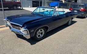 Image result for Black 2000 Impala